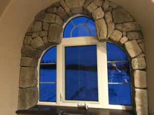 stone home arched window